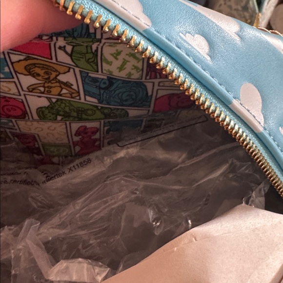 Loungefly Pixar Woody Saloon Backpack — Brown, Blue - Picture 5 of 7